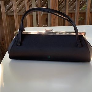 Black satin evening bag elongated “cigar style”